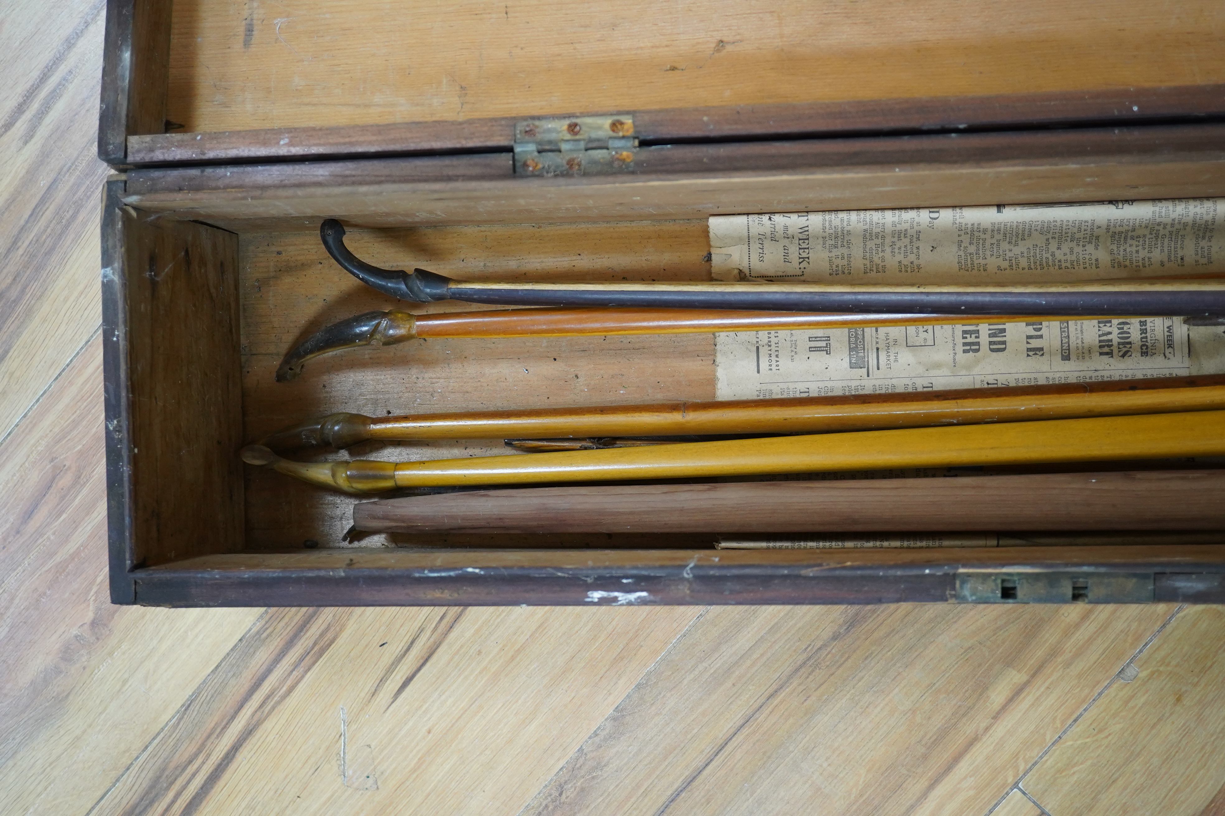 Five Victorian and later archery longbows, a blank for a longbow, and a selection of arrows, boxed. Condition - poor to good.